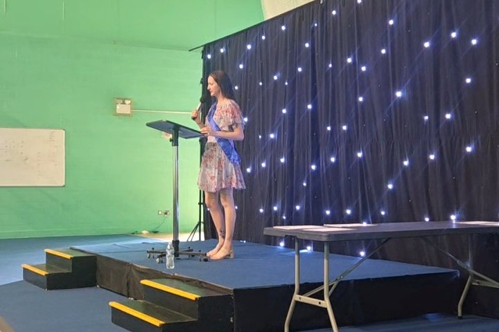 Emma speaking on stage