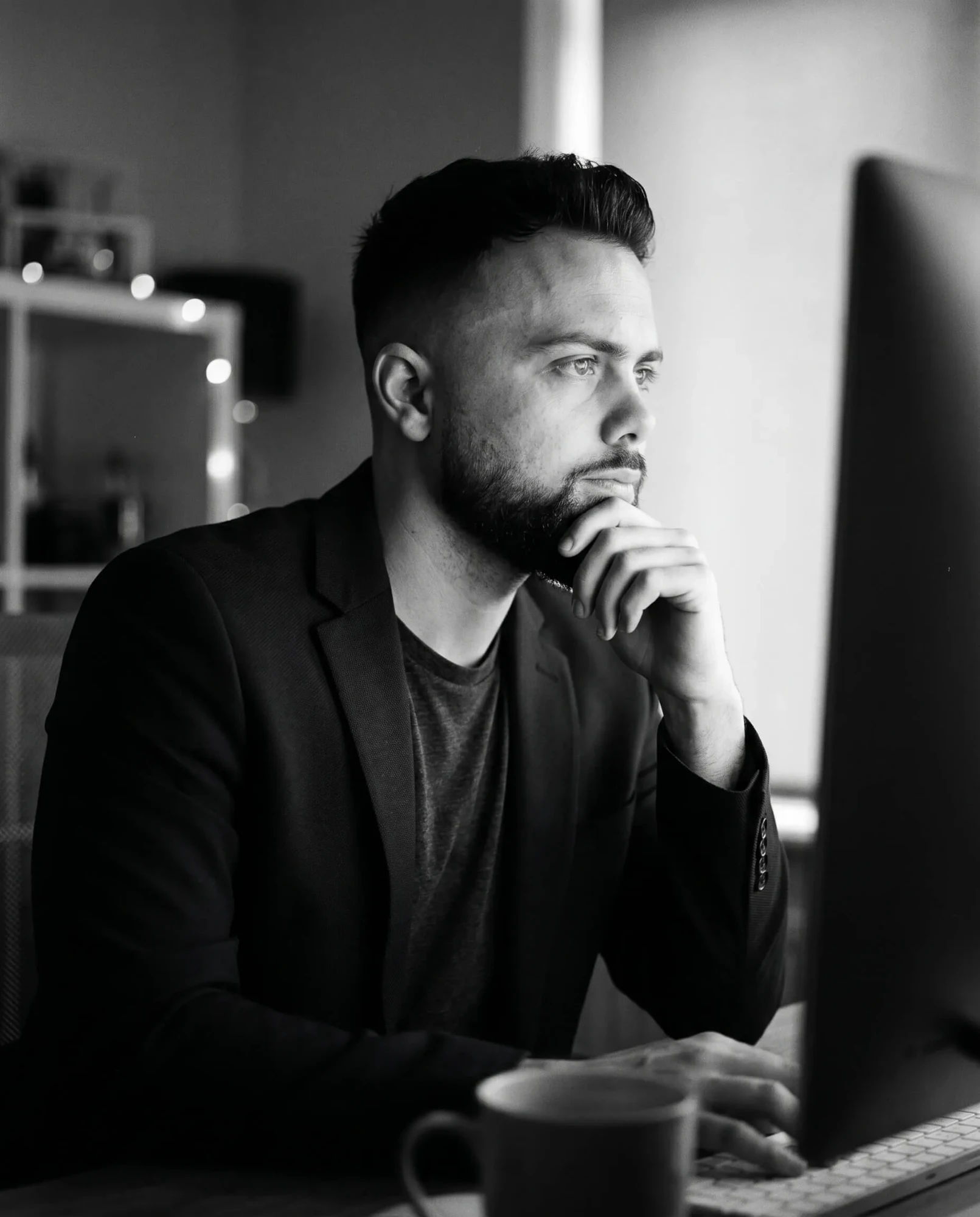Bradley Leivars, founder of Printlogik, at his desk in Derby